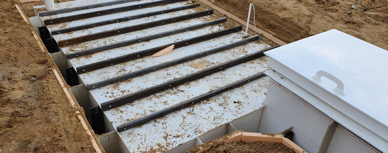 Монтаж погреба на участке